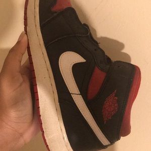 black & red jordan sneaker .